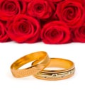 Wedding rings and roses Royalty Free Stock Photo