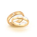 Wedding rings set of gold and silver metal on white background Royalty Free Stock Photo