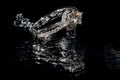 Wedding Rings Sinking in Water, Black Background