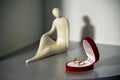 Wedding rings statuette An offer of marriage marriage proposal