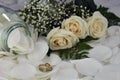 Wedding Rings White Roses Royalty Free Stock Photo