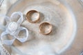 Wedding rings on a white tray with a bow. Preparing for the wedding Royalty Free Stock Photo