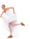 Wedding. Running bride funny woman in sport shoes Royalty Free Stock Photo