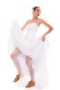 Wedding. Running bride funny woman in sport shoes Royalty Free Stock Photo