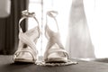 wedding sandals on the brides feet in the bridal room