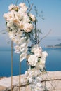 Wedding semi-arch on the observation deck above the sea