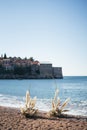 Wedding semi-arch on the seashore overlooking the island of Sveti Stefan. Montenegro
