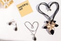 Wedding set: Necklaces forming shape of heart, earrings and jewelry box Royalty Free Stock Photo