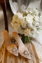 wedding shoes and bride's bouquet on a vintage chair Royalty Free Stock Photo