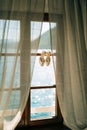 Wedding shoes of the bride at a window. Royalty Free Stock Photo