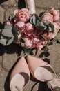 Wedding shoes and wedding paraphernalia, wedding gold rings, wedding bouquet Royalty Free Stock Photo