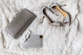 Wedding shoes, purse and garter on a gray background Royalty Free Stock Photo