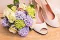 Wedding shoes rings and bouquet Royalty Free Stock Photo