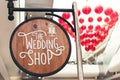 Wedding shop wooden signboard in the shopping mall. Royalty Free Stock Photo