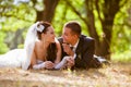 Wedding shot of bride and groom in park Royalty Free Stock Photo