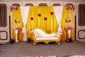 wedding stage. beautiful grand chair for the bride and groom in a golden color theme. Royalty Free Stock Photo