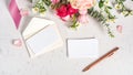 Wedding stationery, event and greeting card, blank card and envelop with rose gold pen and flowers