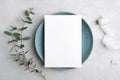 Wedding stationery invitation card mockup 5x7 on grey background with eucalyptus, Menu card mockup with table setting Royalty Free Stock Photo