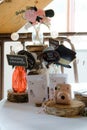 Wedding stationery on the table. Pink camera and photoprops