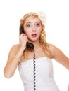 Wedding. Surprised woman bride talking on phone Royalty Free Stock Photo