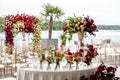 Special floral arrangement on the wedding day on the outdoor table. Royalty Free Stock Photo