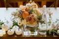 Wedding table with candles and floral centerpieces, adorned with beautiful flowers Royalty Free Stock Photo