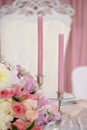 Wedding table with candles, flowers and sign number Royalty Free Stock Photo