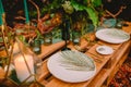 Wedding table, cutlery, candles and floristic. Wedding rustic dinner