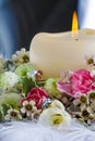 Wedding table decoration with candle and beautiful flowers Royalty Free Stock Photo