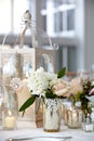 Wedding table decoration series - soft pink and white bouquet of flowers in vases Royalty Free Stock Photo