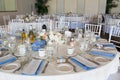 Wedding table decoration series - tables set for beautiful indoor catered luxury wedding event with blue Royalty Free Stock Photo