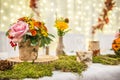 Wedding table with floral arrangement prepared for reception, wedding, birthday or event centerpiece Royalty Free Stock Photo