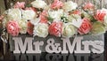 Wedding table floral oasis covered in glitter with mr & mrs