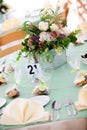 Wedding table with flower centerpiece