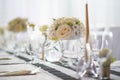 Wedding table with flowers and decorations, wedding centerpiece or event reception in modern style Royalty Free Stock Photo