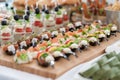 Wedding Table With Food. Snacks and Appetizer on the Table. Fish and Raw Meat with Vegetables. Royalty Free Stock Photo