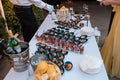Wedding table with glass objects and a lot of cold snacks on buffet table, catering Royalty Free Stock Photo