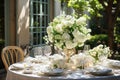 Wedding table, served in a classic style with compositions of white flowers
