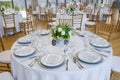 Wedding tables are set for fine dining at a fancy catered event - wedding table series Royalty Free Stock Photo