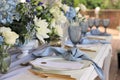 Wedding table set up in pastel blue, gold and white Royalty Free Stock Photo