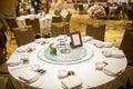 Wedding table sets in wedding hall. wedding decorate preparation. table set and another catered event dinner