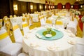 Wedding table sets in wedding hall. wedding decorate preparation. Royalty Free Stock Photo