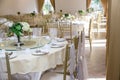 Wedding table sets in wedding hall. wedding decorate preparation. Royalty Free Stock Photo