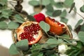 The wedding table setting is decorated with fresh flowers in a brass bowl and golden candles in brass candlesticks. Wedding Royalty Free Stock Photo