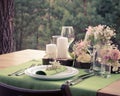 Wedding table setting in rustic style. Royalty Free Stock Photo