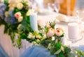 Wedding table settings. Empty plates and glasses on a white tablecloth. Royalty Free Stock Photo