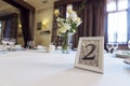 Wedding table with the sign number two Royalty Free Stock Photo