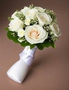 Wedding Theme, Beautiful colorful wedding posy with pink and white roses with green foliage and covered stems