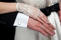 Wedding theme. Hands of the newlyweds together. Royalty Free Stock Photo