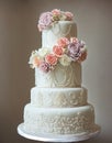 Wedding Theme, Modern style multi-tiered wedding cake with soft intricate designs and multi colored roses